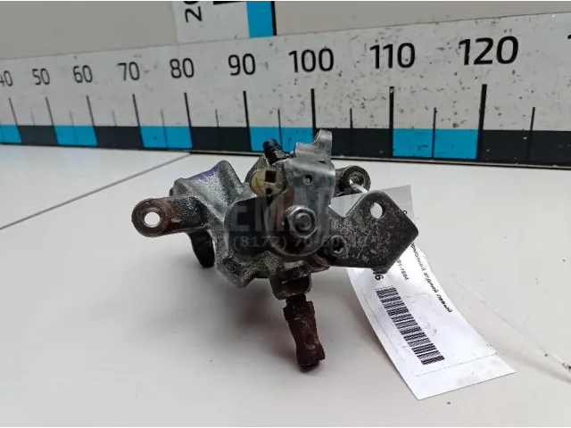 Суппорт тормозной задний левый