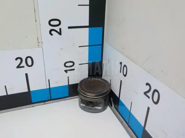 Поршень
