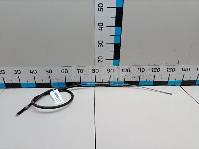 Трос стояночного тормоза