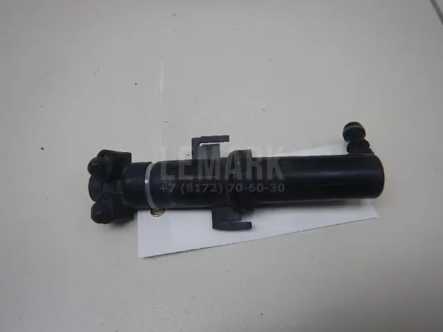 Форсунка омывателя фары