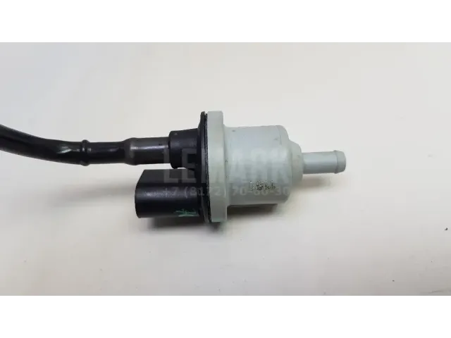 Клапан вакуумный