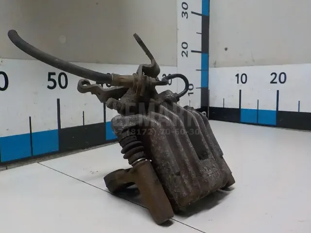 Суппорт тормозной задний правый