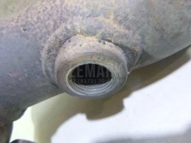 Приемная труба глушителя