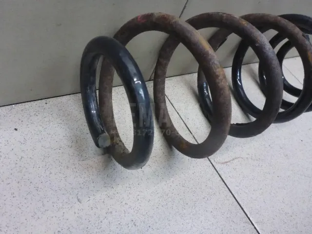 Пружина передняя