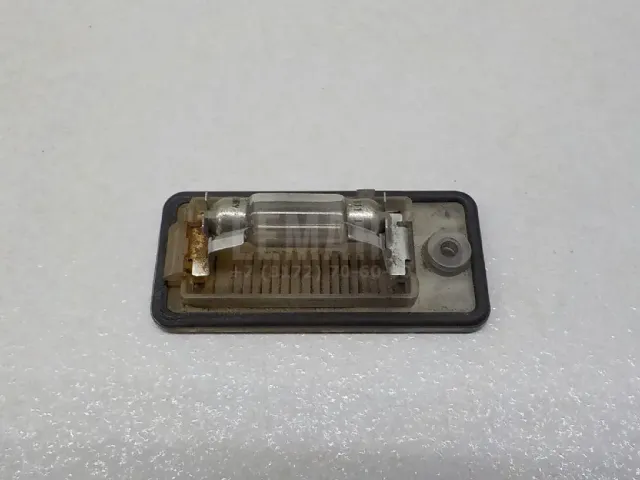 Фонарь подсветки номера для  GM Pontiac Vibe 2002-2007