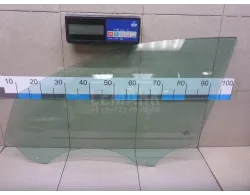 Стекло двери передней левой