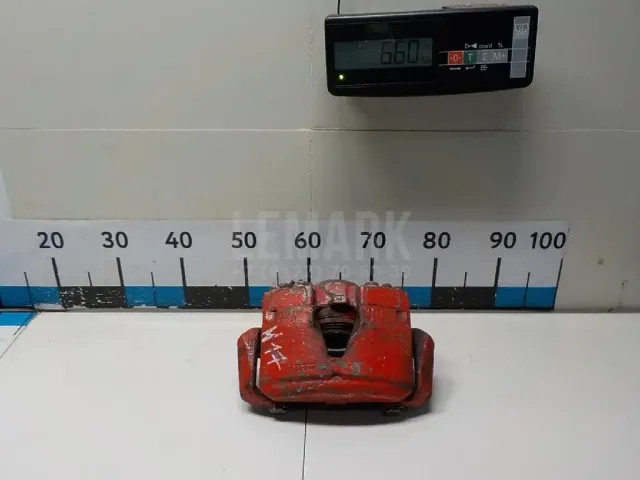 Суппорт тормозной передний левый