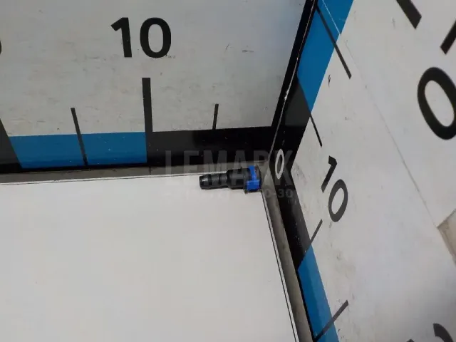 Штуцер трубки омывателя