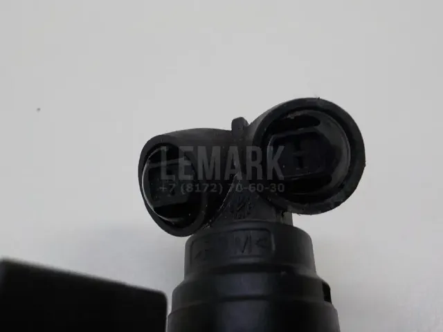 Форсунка омывателя фары