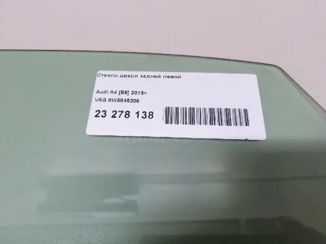 Стекло двери задней левой
