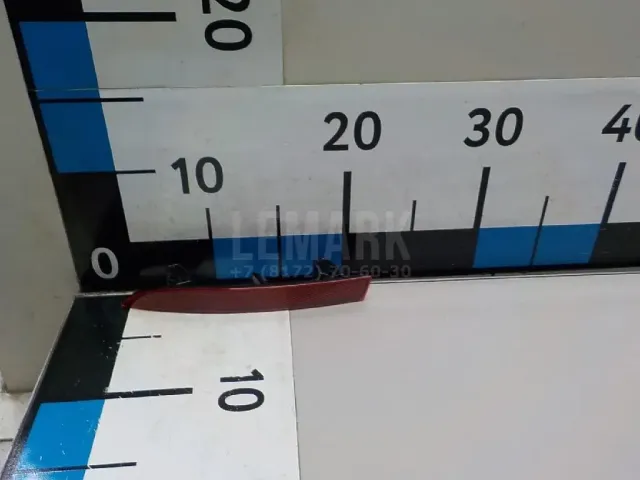 Отражатель в бампер задний левый