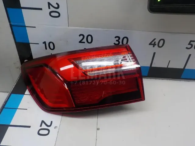 Фонарь задний наружный левый для  Ford Cougar 1998-2001