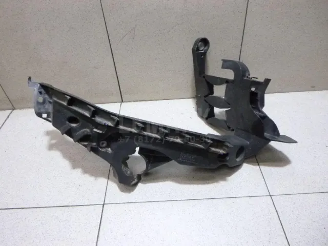 Кронштейн фар правый для  Ford Cougar 1998-2001