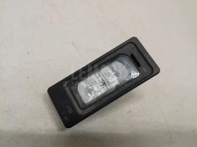 Фонарь подсветки номера для  Ford Maverick 1993-1998