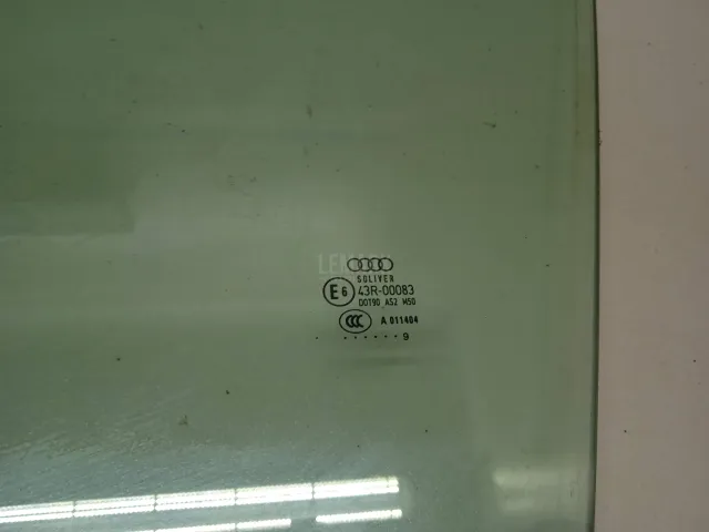 Стекло двери передней левой