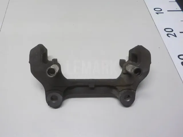 Скоба суппорта переднего для  Ford Maverick 2001-2007