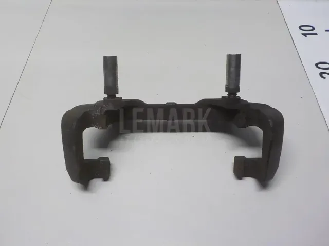 Скоба суппорта переднего для  Ford Maverick 2001-2007