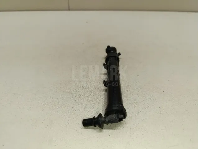 Форсунка омывателя фары