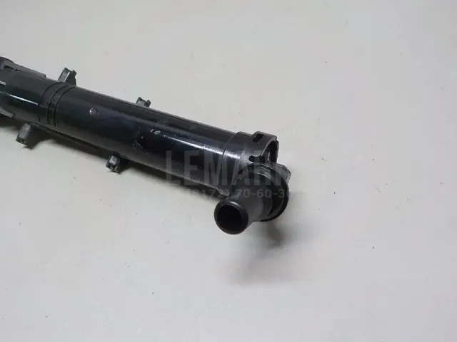 Форсунка омывателя фары