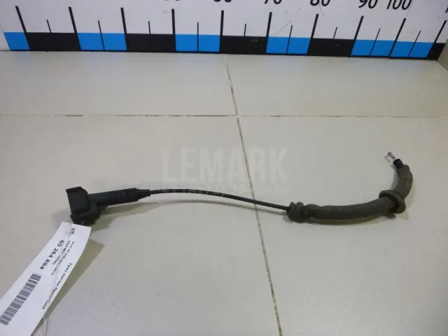 Трос лючка бензобака