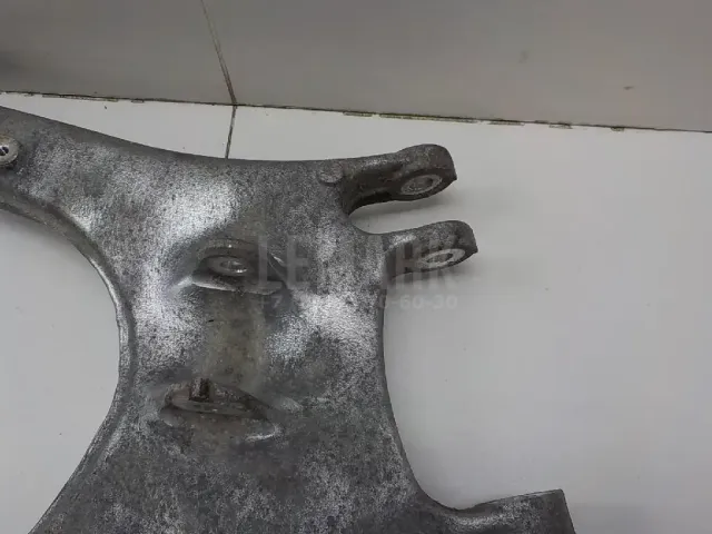 Рычаг задний нижний левый