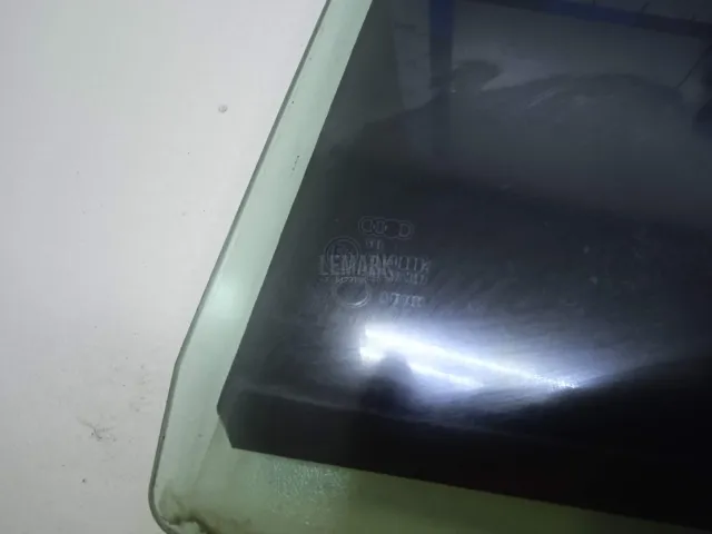 Стекло двери задней левой