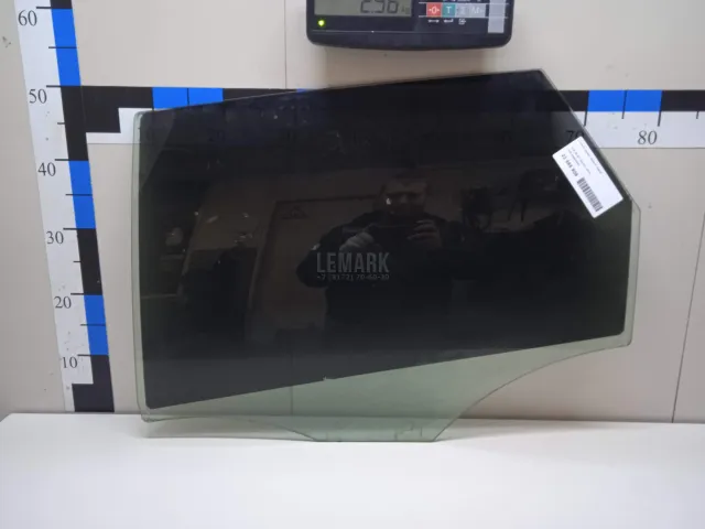 Стекло двери задней левой