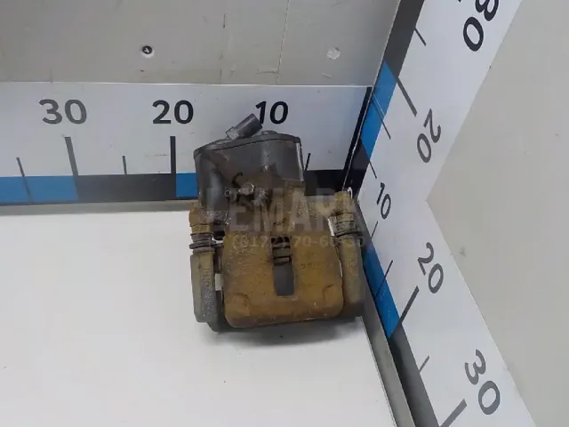 Суппорт тормозной задний правый