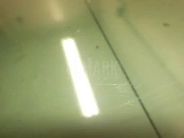 Стекло двери передней левой