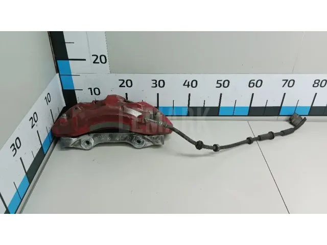 Суппорт тормозной передний левый