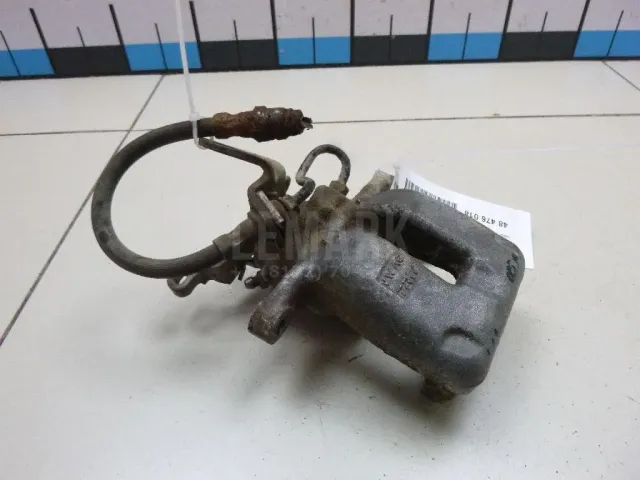 Суппорт тормозной задний правый для  Ford Focus I 1998-2005