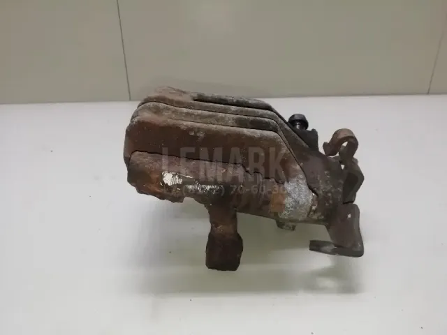 Суппорт тормозной задний левый