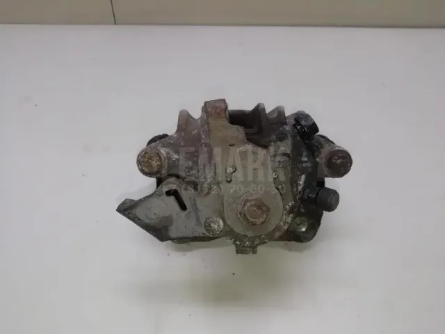 Суппорт тормозной задний левый