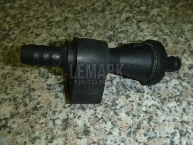 Клапан вакуумный