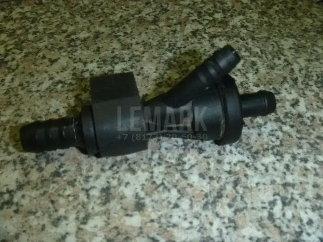 Клапан вакуумный