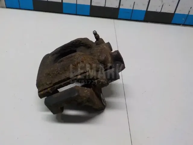 Суппорт тормозной задний левый