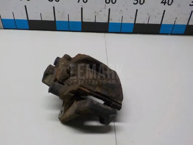 Суппорт тормозной задний левый