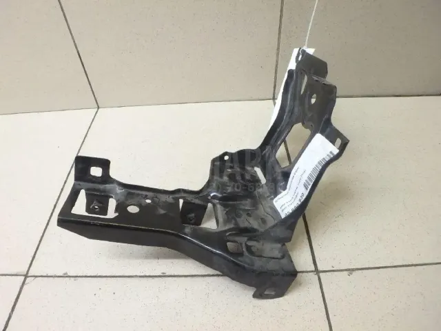 Кронштейн крепления фары для  FAW J5 2004