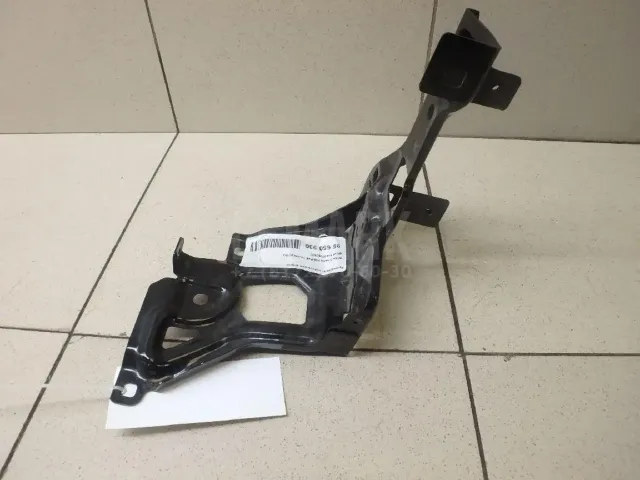 Кронштейн крепления фары для  FAW J5 2004
