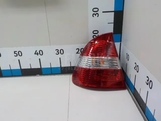 Фонарь задний наружный левый