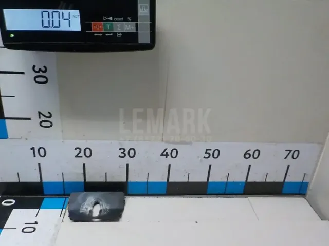 Кожух замка багажника