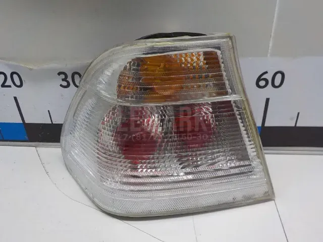 Фонарь задний наружный левый