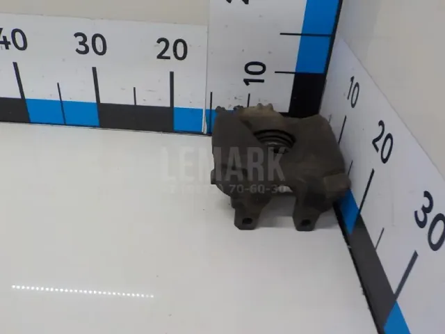Суппорт тормозной передний левый
