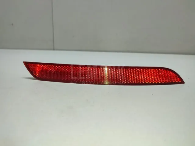 Отражатель в бампер задний левый для  Citroen C5 2008-2017