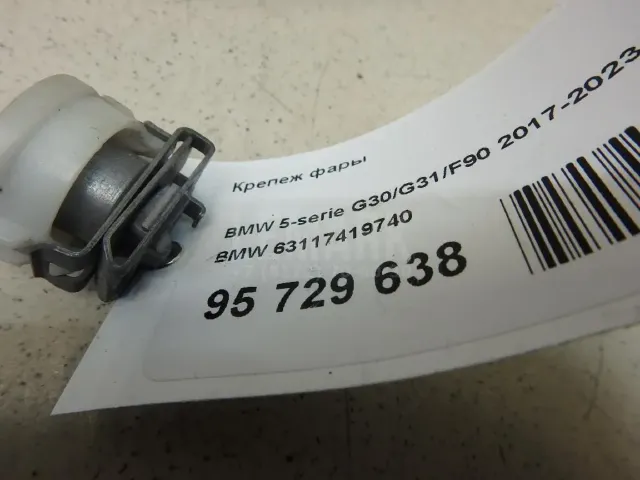 Крепеж фары для  Cadillac Escalade II 2000-2006