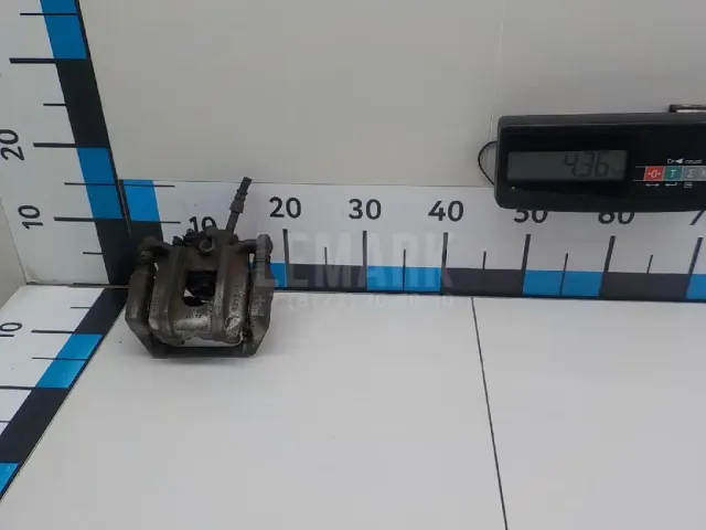 Суппорт тормозной задний левый