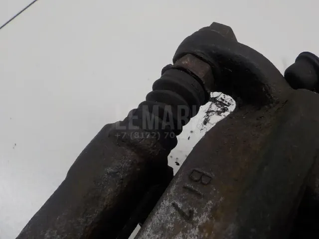 Суппорт тормозной задний левый