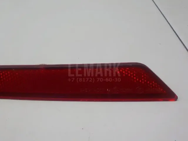 Отражатель в бампер задний левый для  GM Saturn VUE 2001-2007