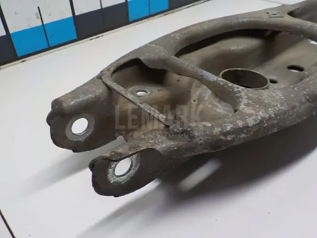 Рычаг задний нижний