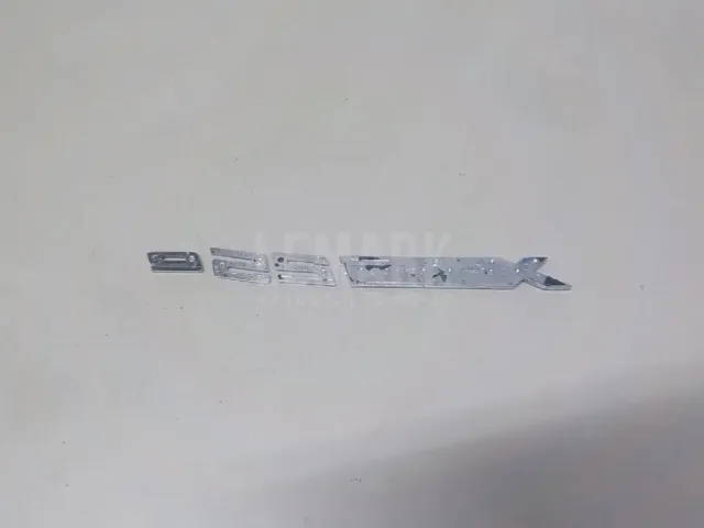 Эмблема на крышку багажника